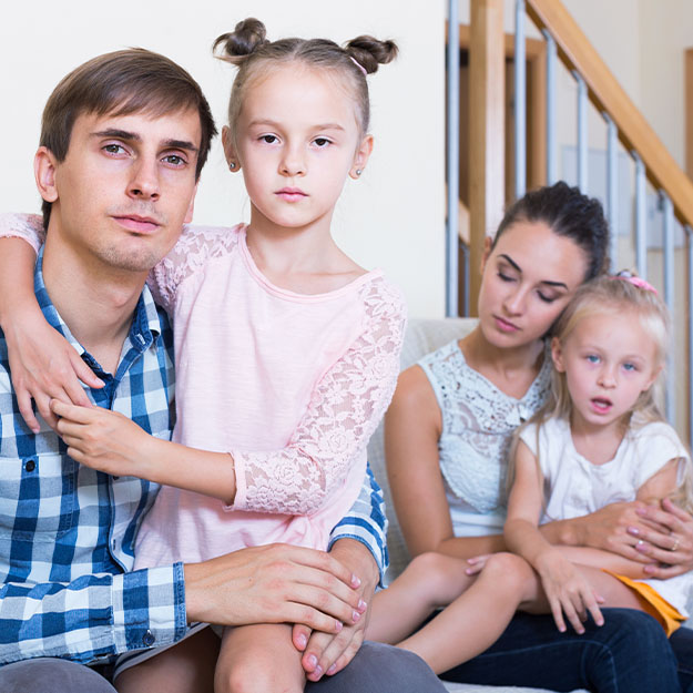 Adult parents going through divorce and thinking about kids future.