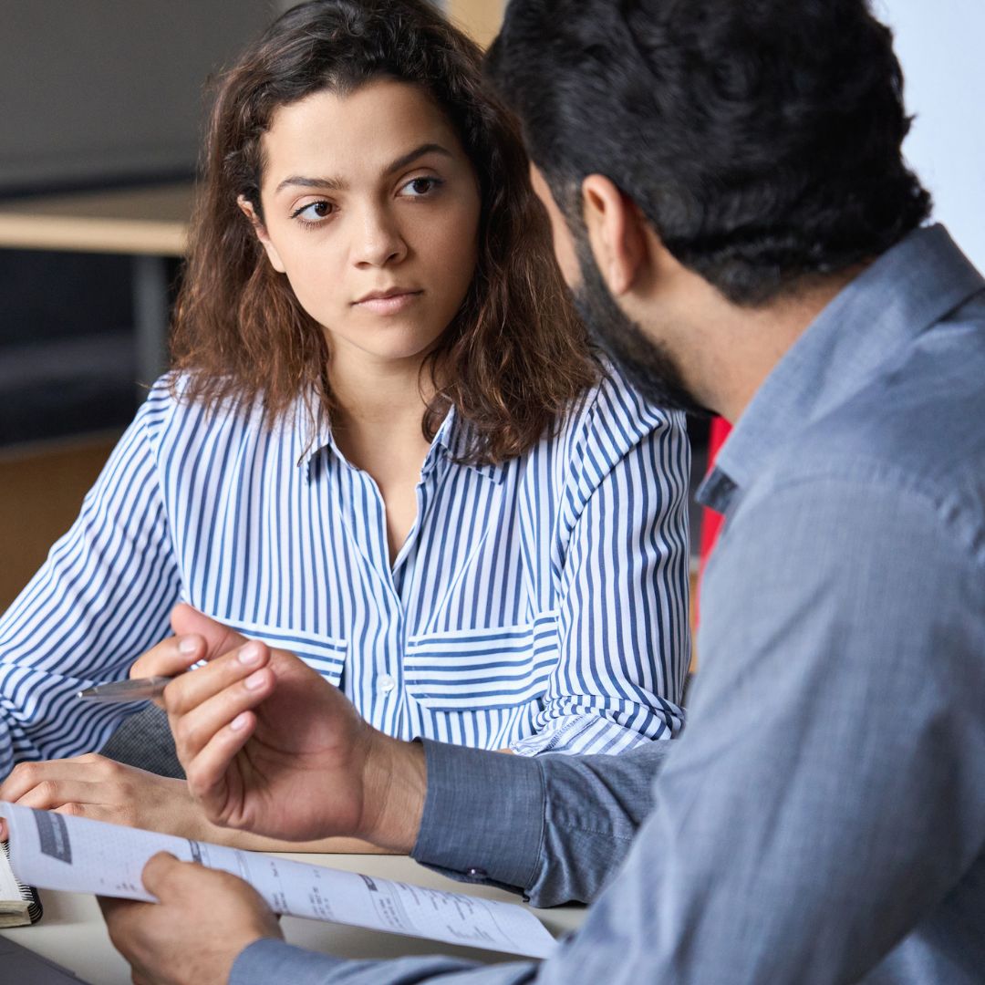 a woman and a man talking