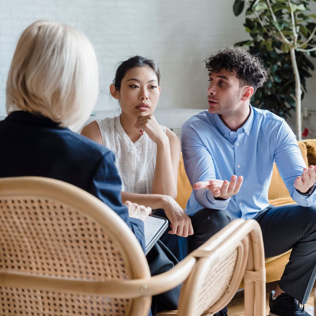 an attorney talking to a couple