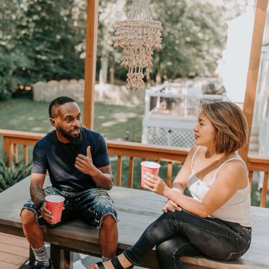 a man and a woman talking
