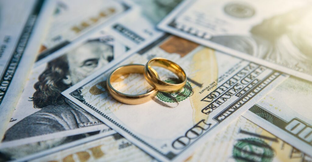 wedding rings on money