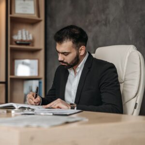 cost of mediation vs litigation in family law - lawyer reviewing paperwork