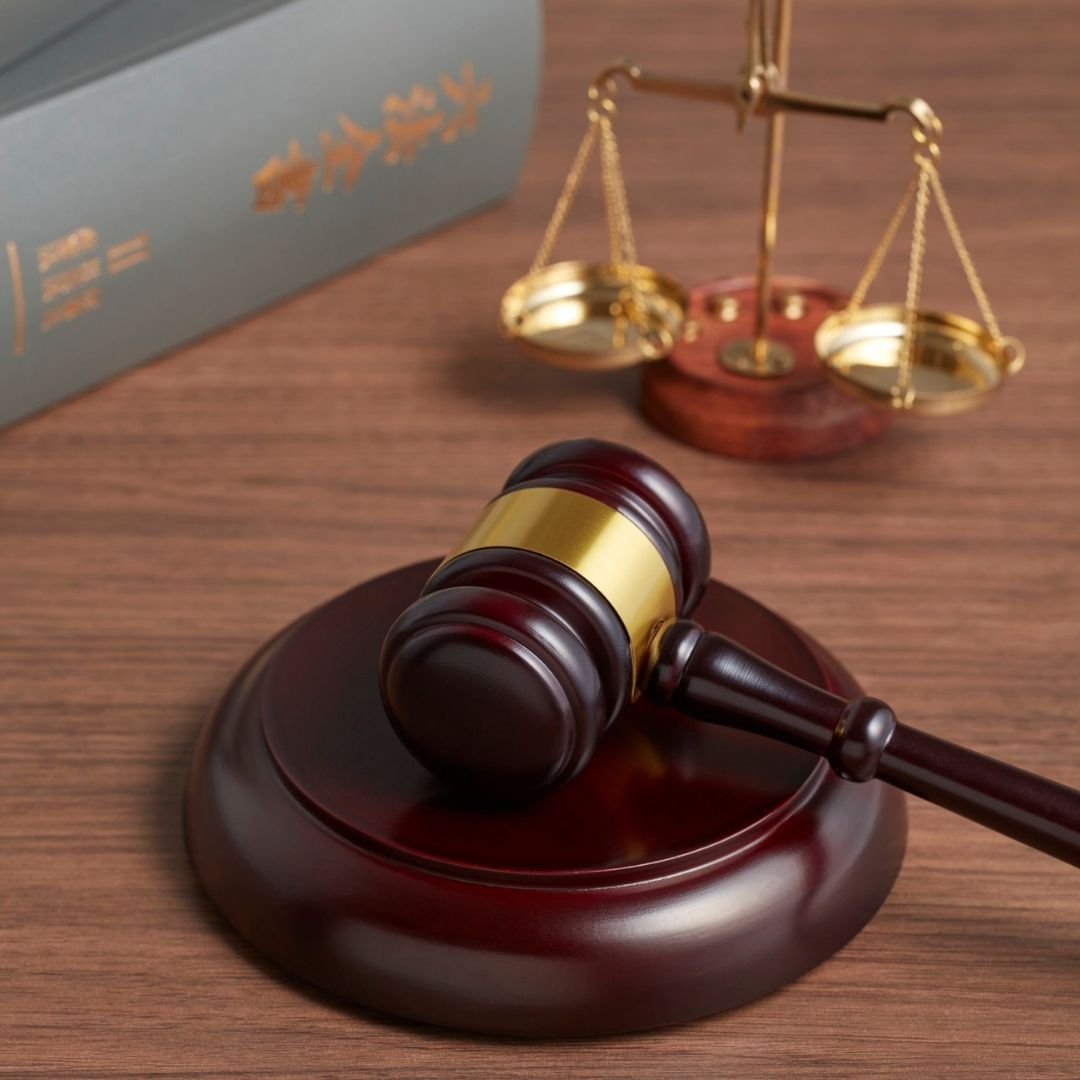 a gavel and scale representing a court hearing