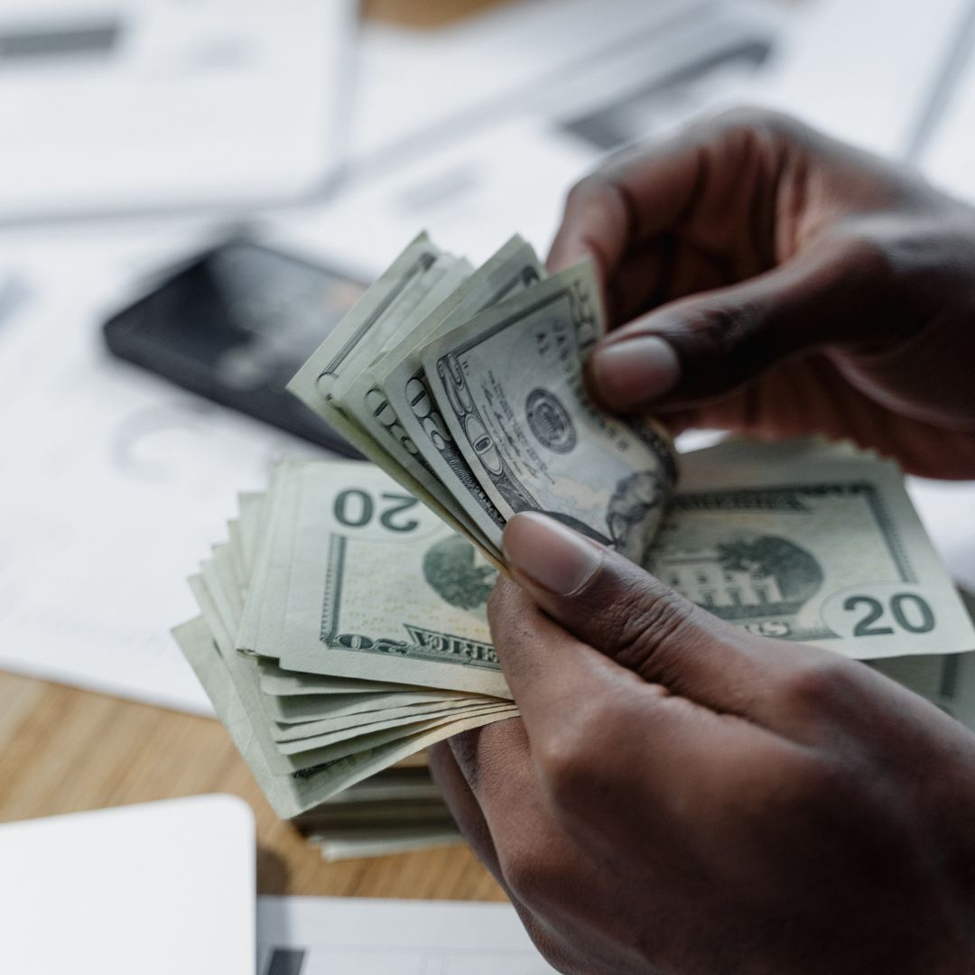 person counting money