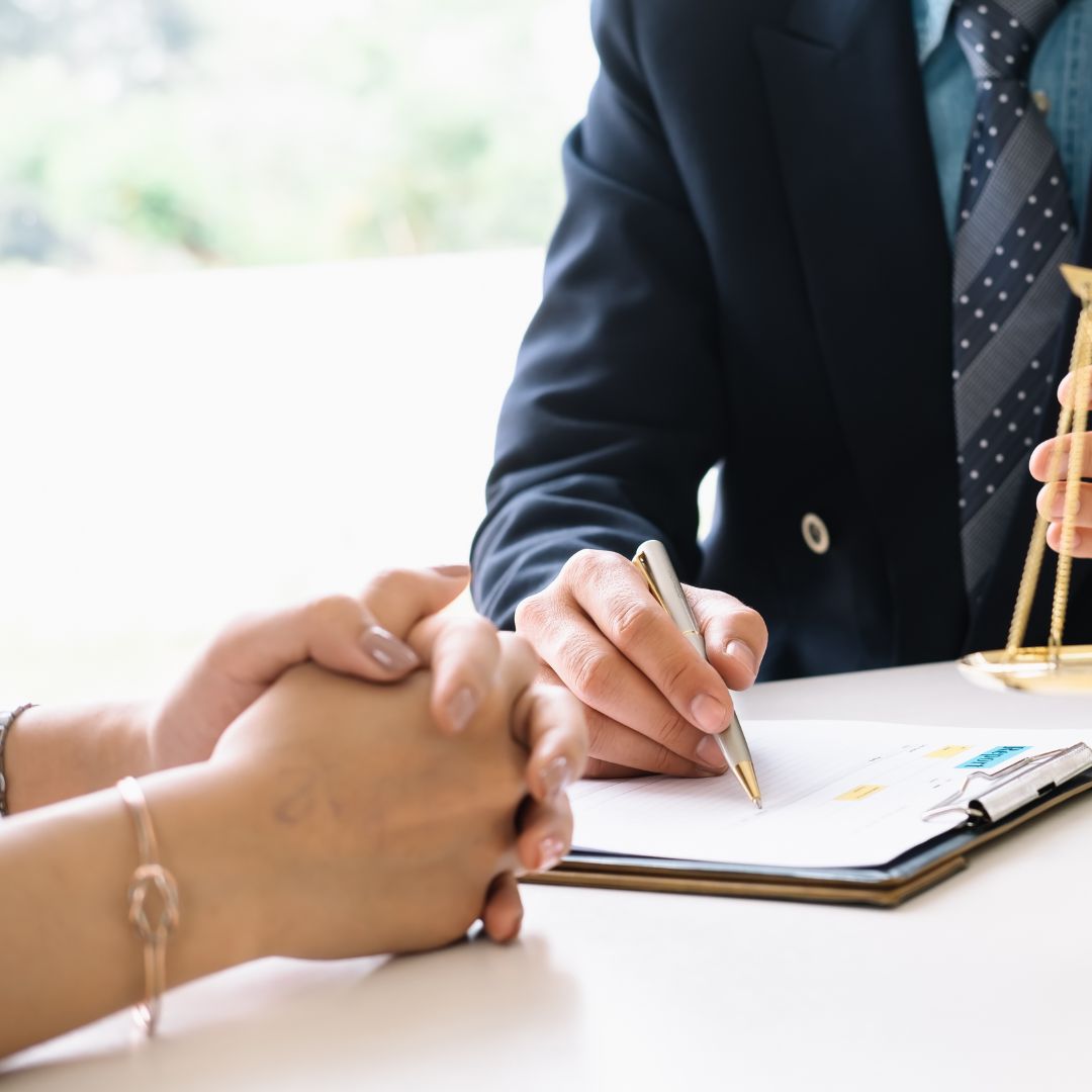 woman talking to a divorce lawyer