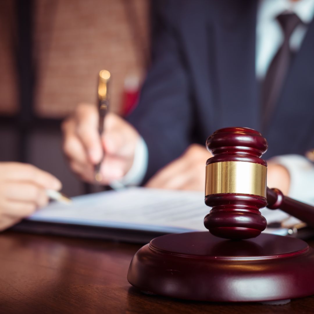 person meeting with an attorney about child custody agreements